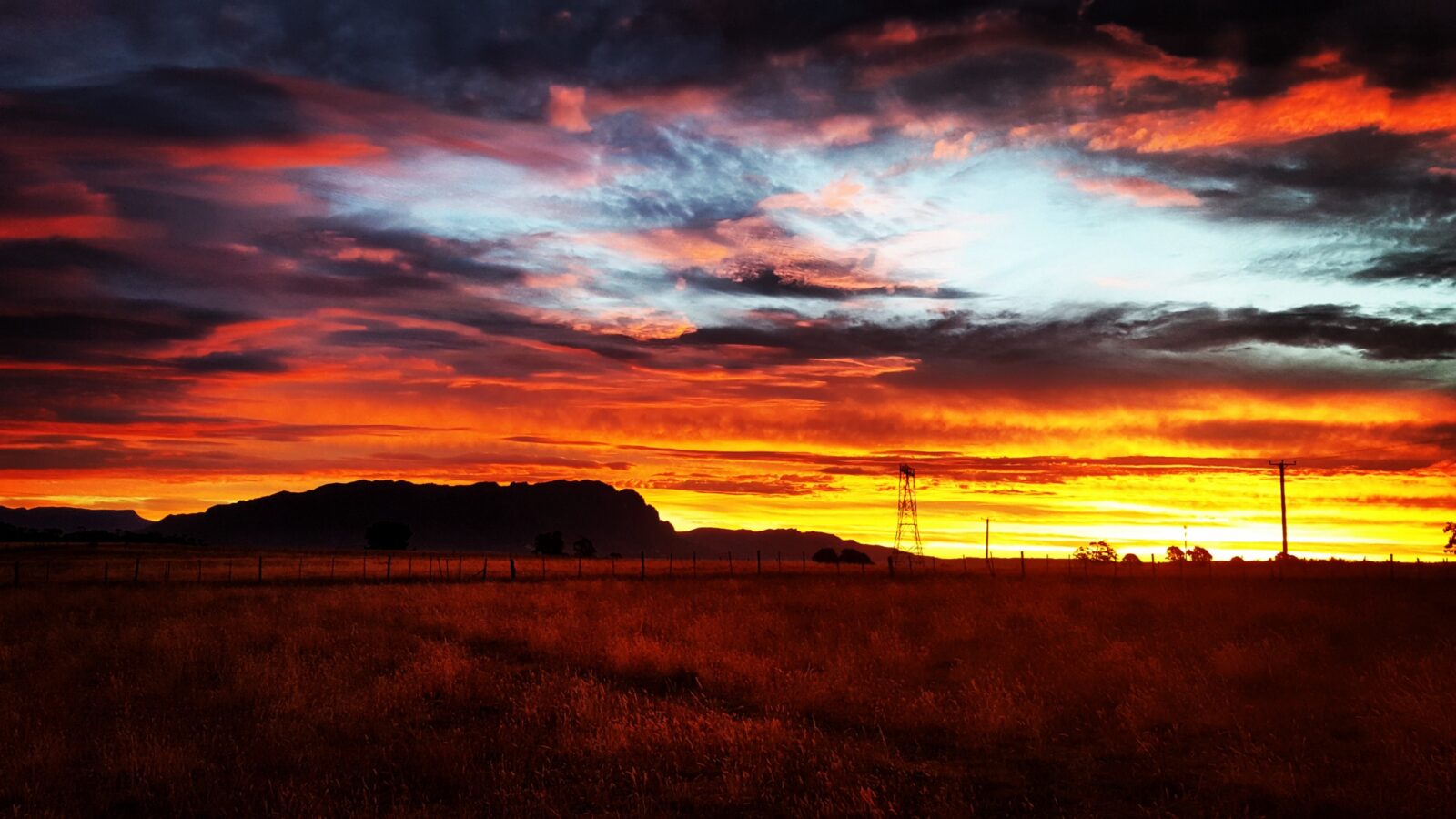 Stunning sunset photo across Mount Roland in Tasmania